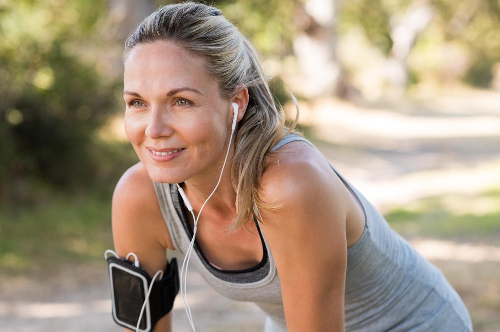 Woman outside on a run after peptide therapy in Grapevine, TX